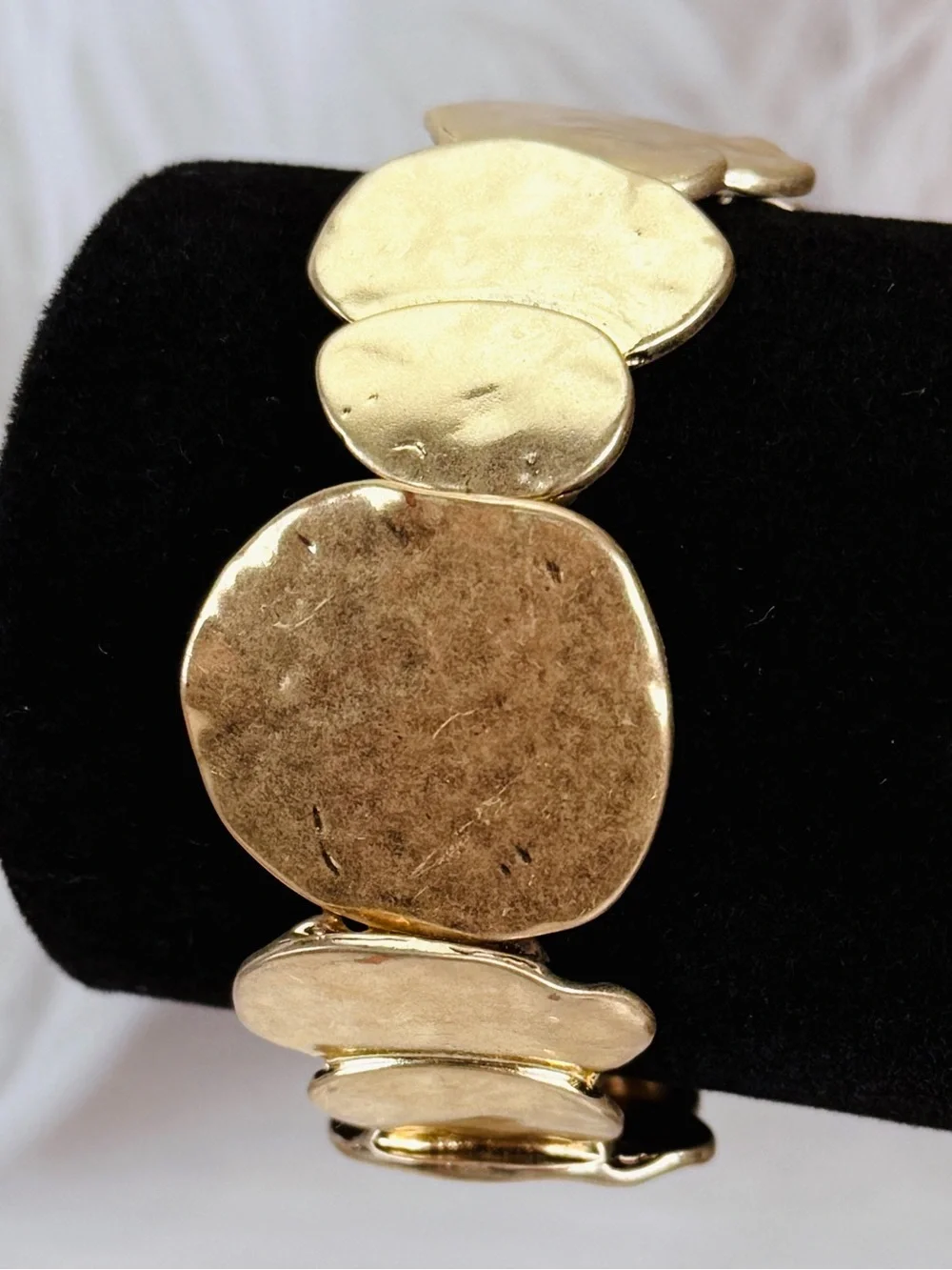 Pretty goldtone, hammered costume stretch bracelet